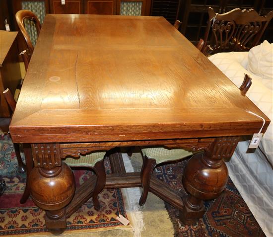 An 18th century-style, Dutch design oak draw leaf dining table, 135 x 90cm